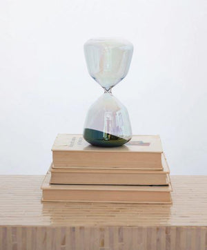 Hourglass Decor, let this black sand hourlgass keep time in an stylish and interesting way. 